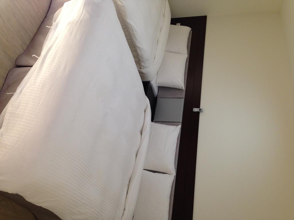 Big Bear Hotel Kaohsiung Rom bilde